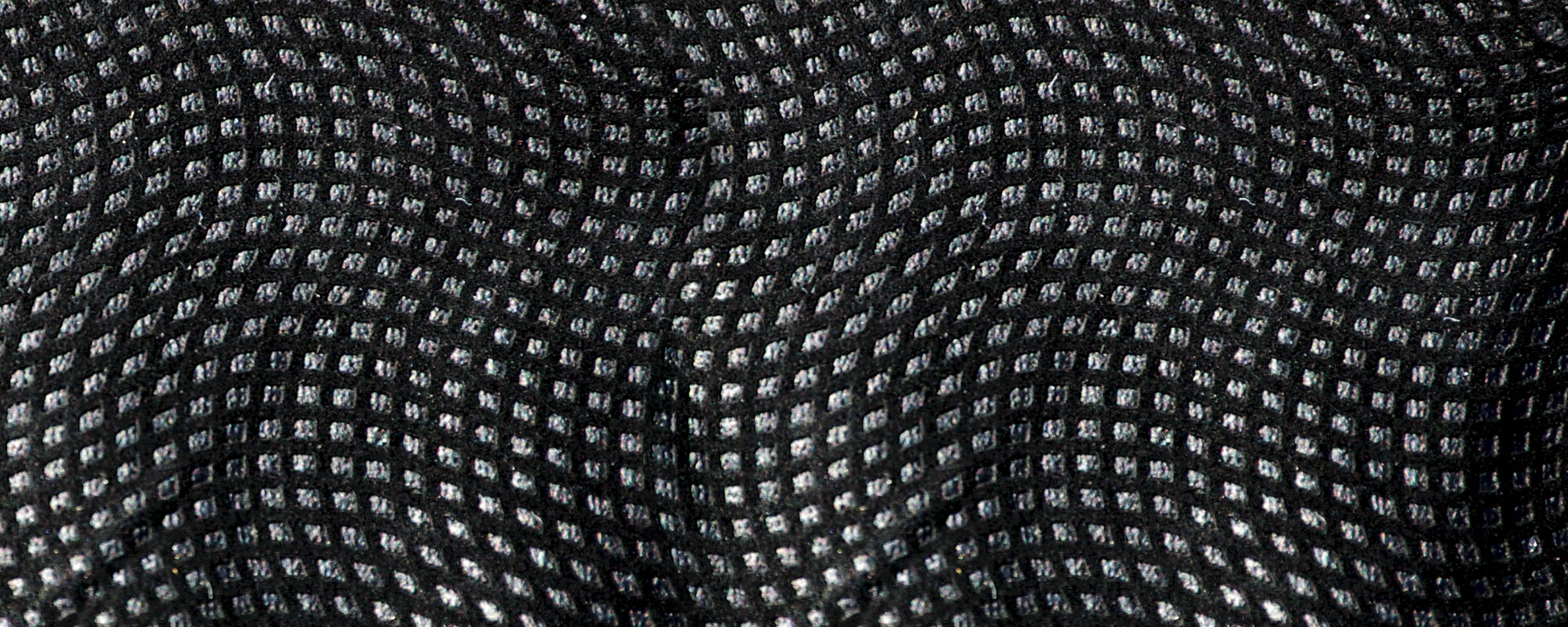 Close-up of 2100 digital black fabric showing grip texture.
